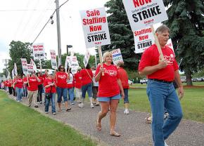 Nurses in Minnesota's Twin Cities picket outside Mercy Hospital
